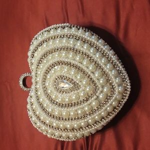 Special occasion or any occasion heart shape multi function purse